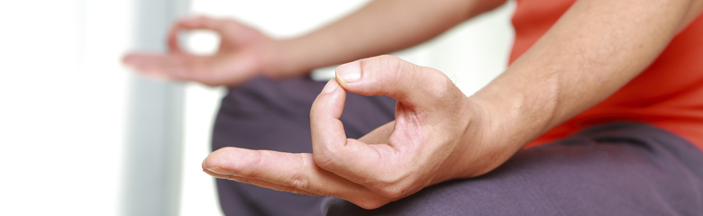 close-up of hands during meditation