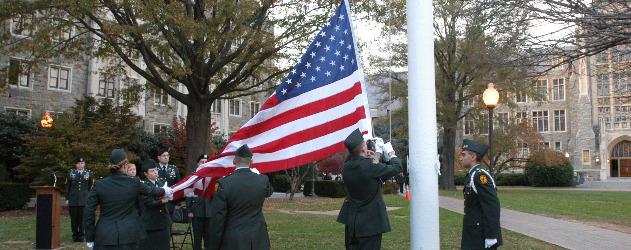 Raising the American Flag on campus. 