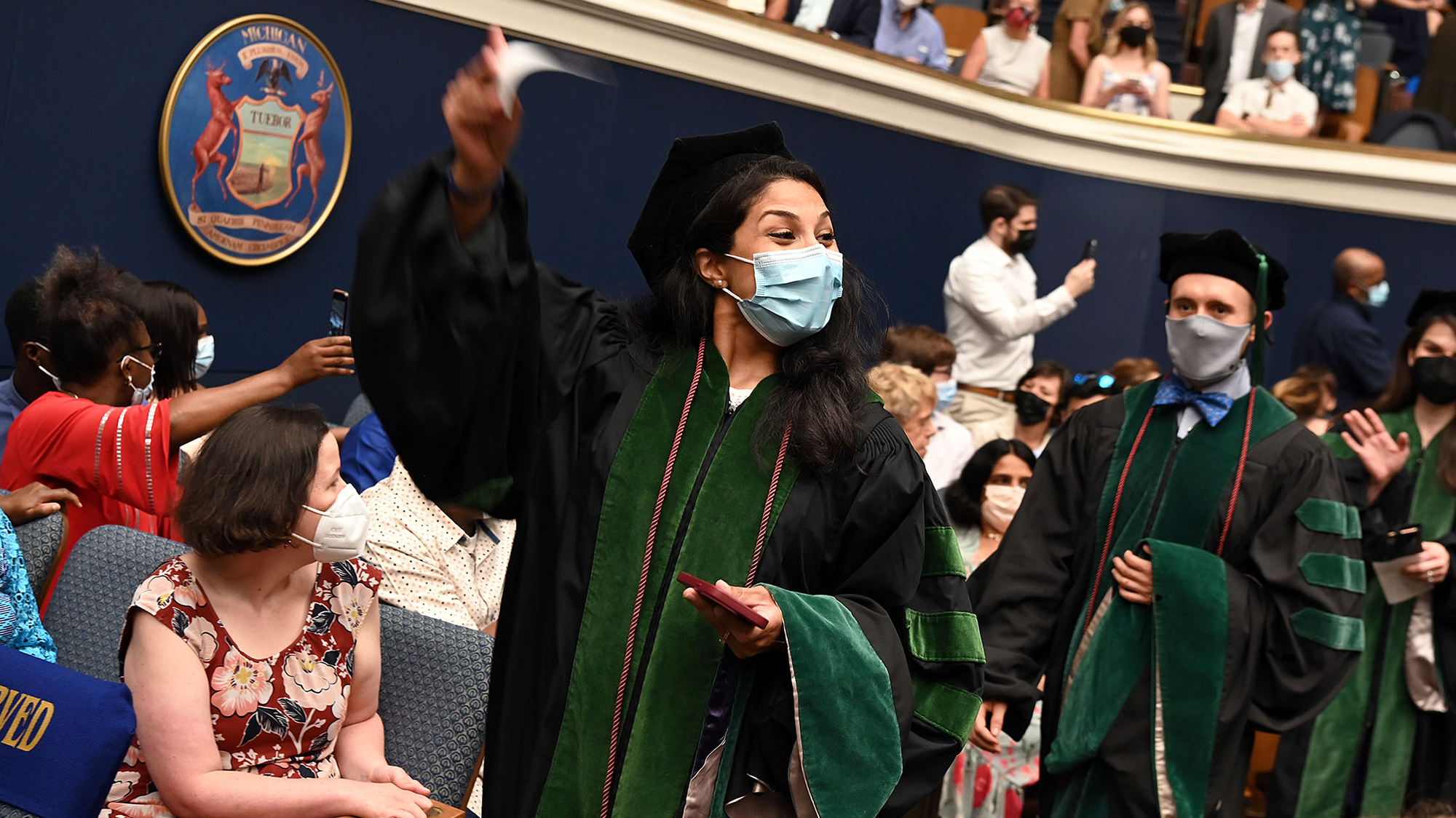 Jubilant medical students process at commencement