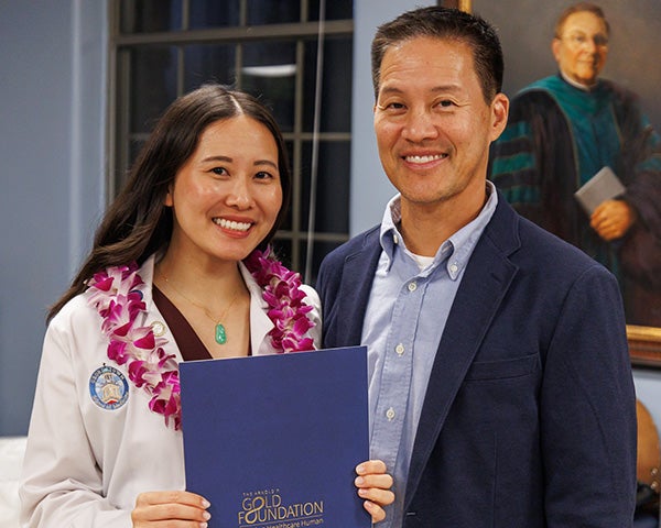 Lauren Yap and her father stand together