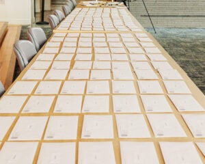 Envelopes line a table on Match Day