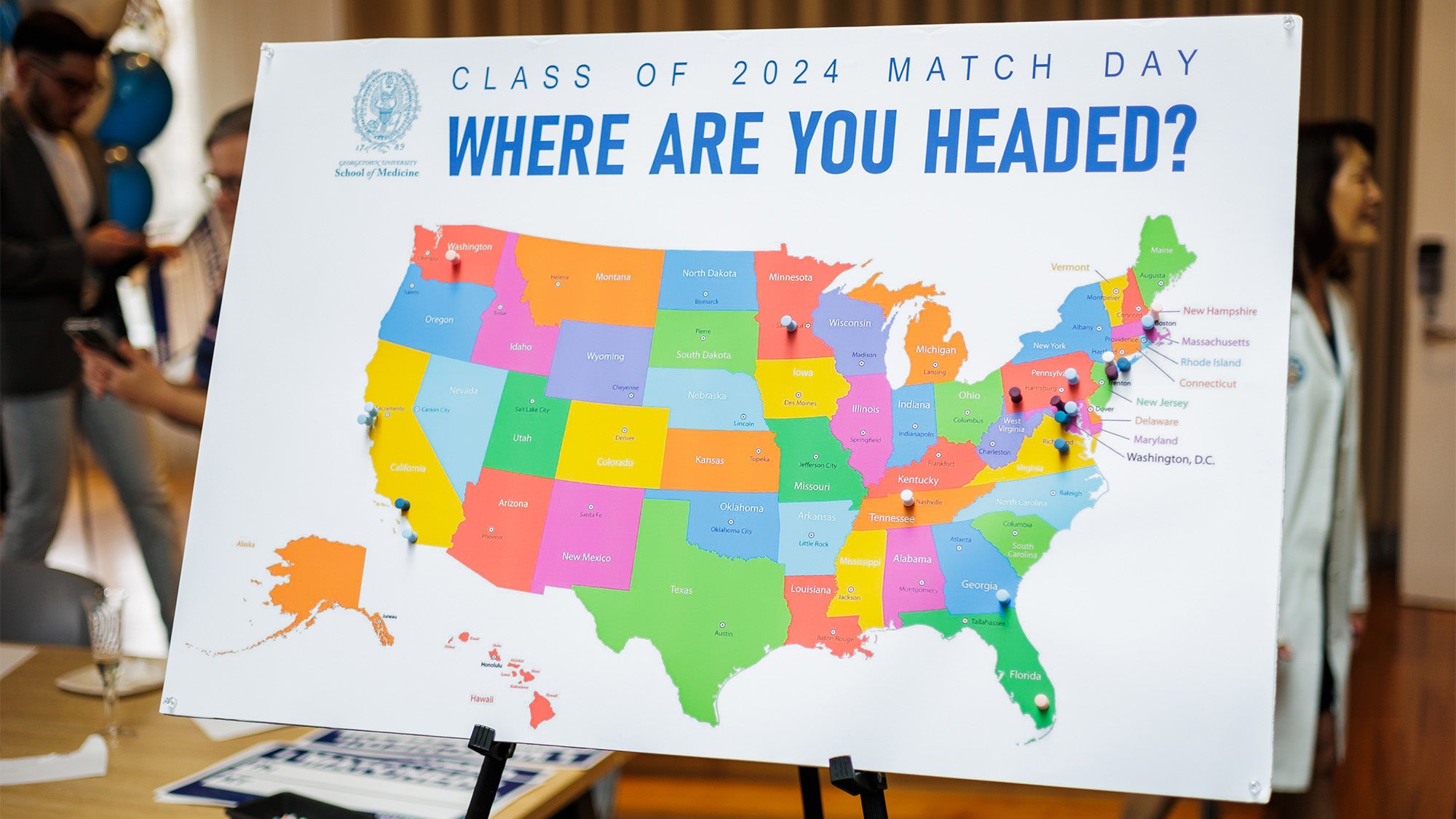 A U.S. map with the words where are you headed? with pins showing where students will go for residency