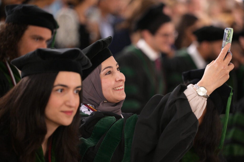 Ruba Omeira takes a selfie in the crowd of fellow students