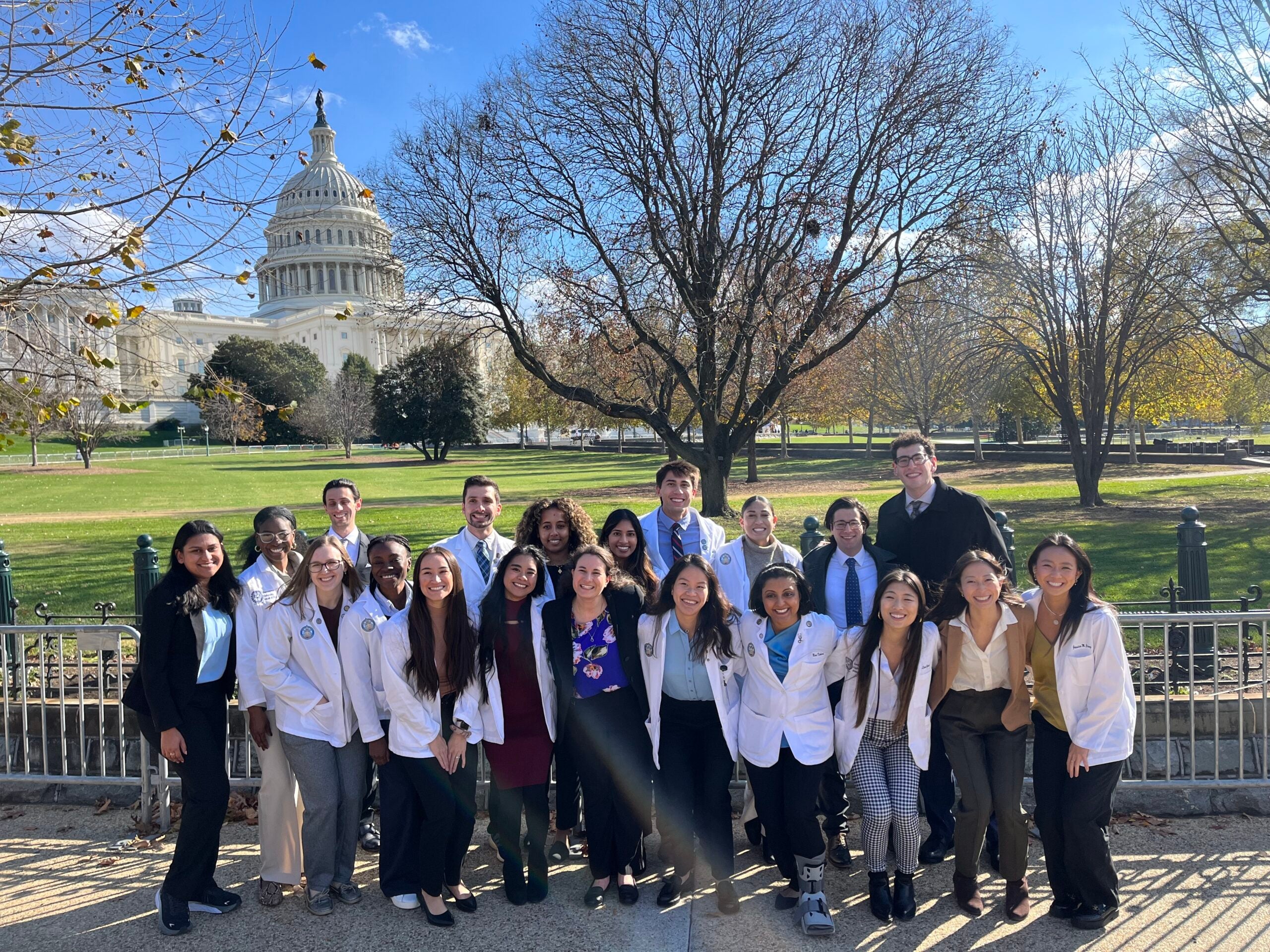 Medical students and Law students pose together in front of the Capitol Building after Capitol Hill Day